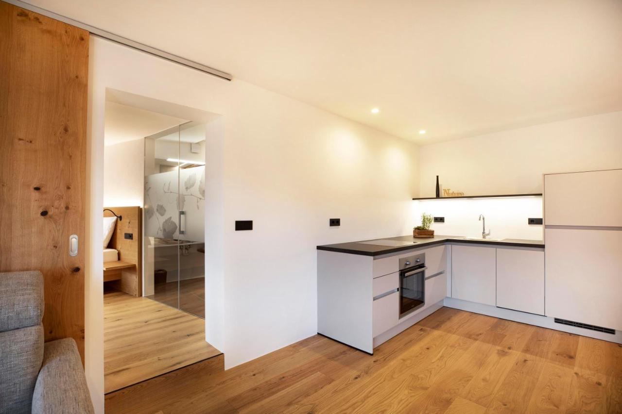 Brantenhof Ferienwohnung Vinea Cortaccia Exteriör bild